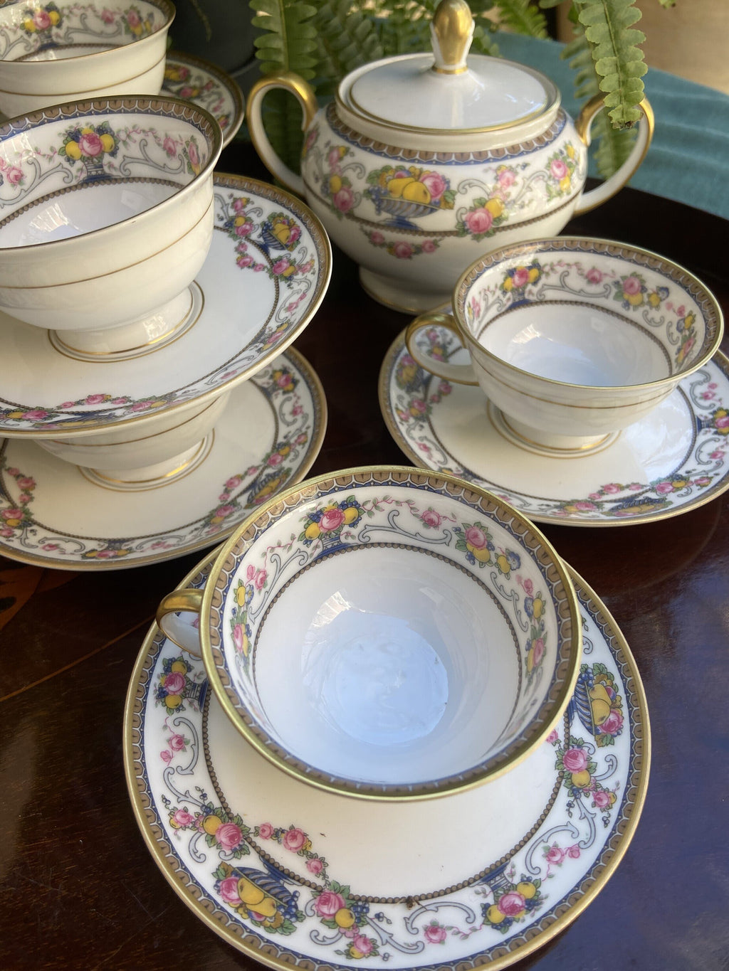 6 tazas de café y azucarero en porcelana alemana "Rossenthal"