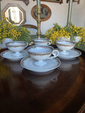 4 tazas de café con plato en fina porcelana.