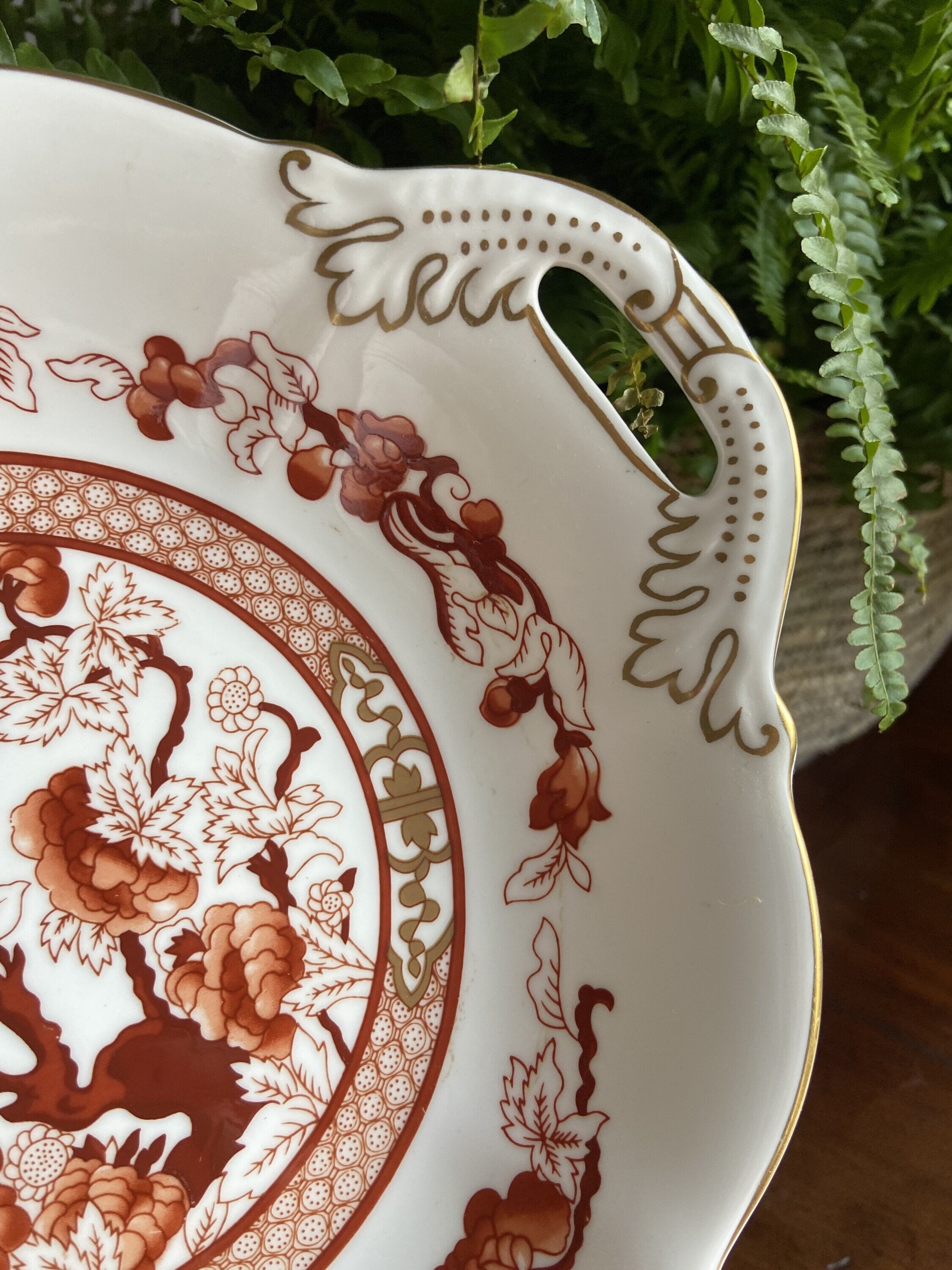 Fuente redonda con asas en porcelana inglesa "Coalport".