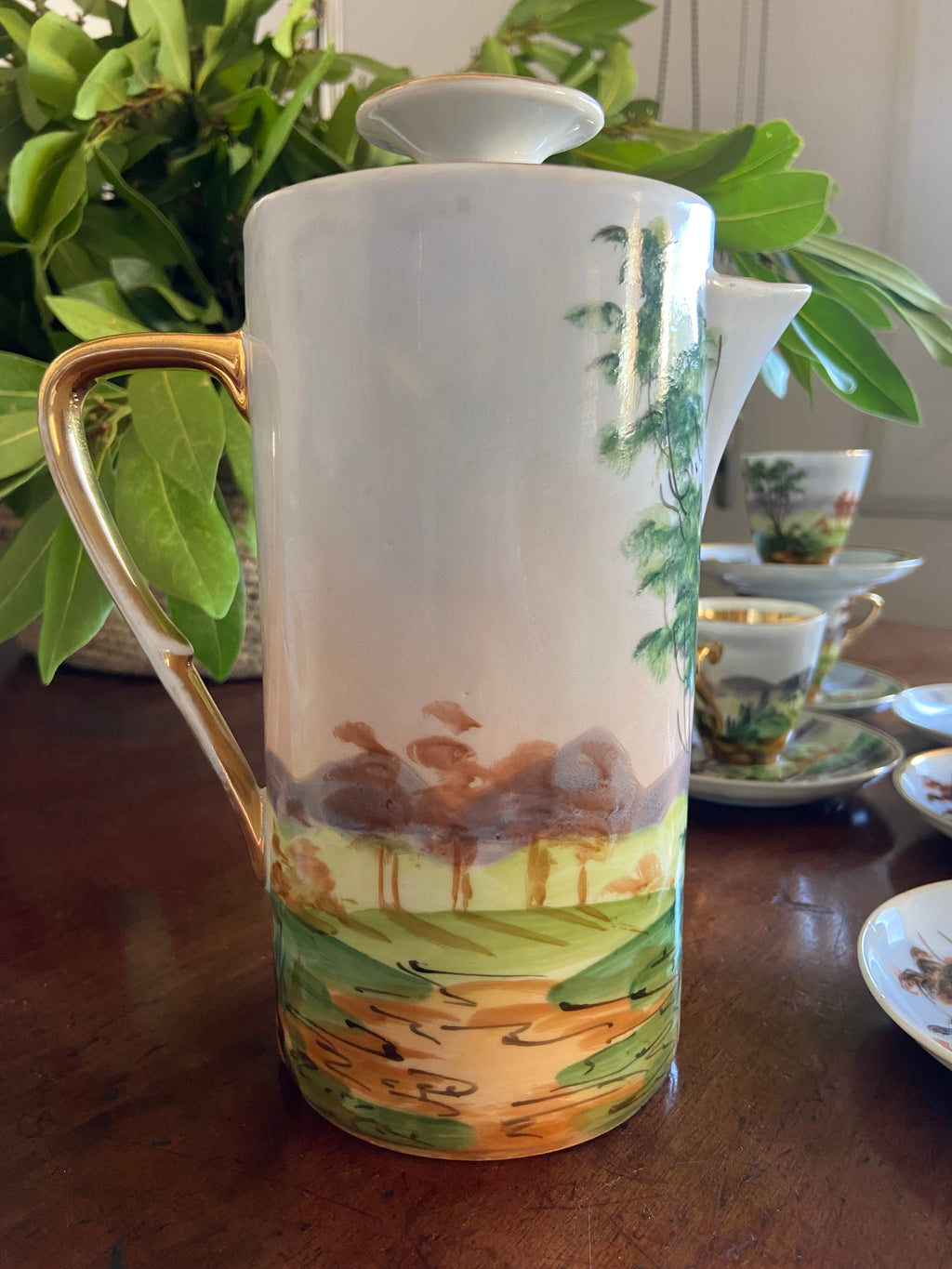 Cafetera, lechera y 6 tazas con plato en porcelana de Limoges