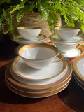 5 tazas de té con plato y 6 platos de merienda en porcelana "Bidasoa".